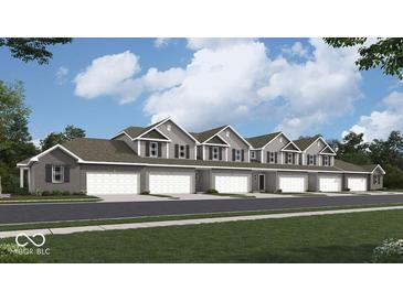New townhomes with attached garages feature traditional architectural design, set against a bright sky at 6303 Wasco Dr, Whitestown, IN 46075
