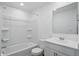 Bathroom featuring white vanity and cabinets, shower and tub combo, a sink, and a framed mirror at 16969 Cole Evans Dr, Noblesville, IN 46060