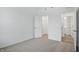 Bedroom featuring neutral carpeting, natural light, and walk-in closet access at 16969 Cole Evans Dr, Noblesville, IN 46060