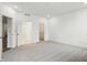 Spacious bedroom featuring plush carpeting, neutral decor and double door closet entrances for ample storage solutions at 16969 Cole Evans Dr, Noblesville, IN 46060