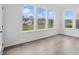 Bright bedroom with large windows offering a view of the neighborhood at 16969 Cole Evans Dr, Noblesville, IN 46060