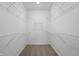 Walk-in closet with wire shelving provides efficient storage solutions for any wardrobe needs at 16969 Cole Evans Dr, Noblesville, IN 46060