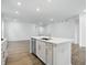 Spacious kitchen featuring a kitchen island with stainless steel dishwasher and sink at 16969 Cole Evans Dr, Noblesville, IN 46060
