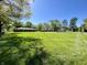 Expansive backyard with lush lawn, bordering neighboring properties at 2892 S State Road 267, Plainfield, IN 46168