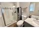 Bright bathroom featuring a glass shower, toilet, and vanity with marble countertop at 2892 S State Road 267, Plainfield, IN 46168