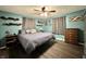 Comfortable bedroom with stylish décor, hardwood floors, and ample storage at 2892 S State Road 267, Plainfield, IN 46168