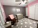 Sweet Bedroom featuring a rocking chair, changing table, dresser, and star-patterned rug at 2892 S State Road 267, Plainfield, IN 46168
