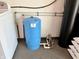 Water pressure tank with plumbing and connections in utility area at 2892 S State Road 267, Plainfield, IN 46168