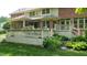 Deck and patio area with lush landscaping at 4738 Moss Creek Ct, Indianapolis, IN 46237