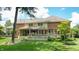 Spacious deck with screened porch and lush landscaping at 4738 Moss Creek Ct, Indianapolis, IN 46237
