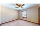 Simple bedroom with ceiling fan and window at 4738 Moss Creek Ct, Indianapolis, IN 46237