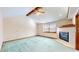 Bedroom with vaulted ceiling, fireplace, and light carpet at 4738 Moss Creek Ct, Indianapolis, IN 46237