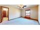 Bright bedroom featuring a window and ceiling fan at 4738 Moss Creek Ct, Indianapolis, IN 46237