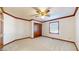 Charming bedroom with wood trim and ceiling fan at 4738 Moss Creek Ct, Indianapolis, IN 46237