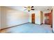 Spacious bedroom with ample closet space and neutral carpeting at 4738 Moss Creek Ct, Indianapolis, IN 46237
