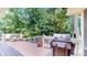 Spacious deck with grill, overlooking a wooded area at 4738 Moss Creek Ct, Indianapolis, IN 46237