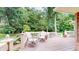 Deck with seating area overlooking the backyard at 4738 Moss Creek Ct, Indianapolis, IN 46237