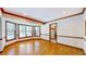 Bright dining room with hardwood floors and built-in window seat at 4738 Moss Creek Ct, Indianapolis, IN 46237