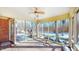 Screened porch with wooded views and access to deck at 4738 Moss Creek Ct, Indianapolis, IN 46237