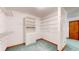 Large walk-in closet with shelving and drawers at 4738 Moss Creek Ct, Indianapolis, IN 46237