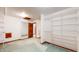 Bright walk-in closet with wire shelving and mirror at 4738 Moss Creek Ct, Indianapolis, IN 46237