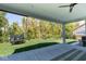 Expansive backyard featuring a well-maintained lawn, trampoline, swing set and plenty of room for outdoor activities at 8722 Rockwood Ln, Indianapolis, IN 46259