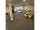Spacious basement with carpeted flooring and plenty of room for recreation and storage at 8722 Rockwood Ln, Indianapolis, IN 46259