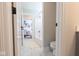 Bathroom featuring neutral tones with marble floors and a full tub/shower combo at 8722 Rockwood Ln, Indianapolis, IN 46259