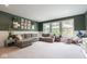 Spacious living area with large windows, perfect for Gathering gatherings and relaxation at 8722 Rockwood Ln, Indianapolis, IN 46259
