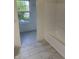 View of the bathroom including the bathtub and tile flooring, with a bedroom beyond at 17902 Cristin Way, Westfield, IN 46062