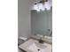 Contemporary bathroom featuring a granite countertop, stainless faucet, and modern lighting at 17902 Cristin Way, Westfield, IN 46062