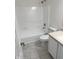Bright bathroom featuring a shower-tub combination and modern finishes at 17902 Cristin Way, Westfield, IN 46062