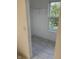 Walk-in closet with wire shelving and beige marble tile flooring with window view at 17902 Cristin Way, Westfield, IN 46062