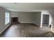 Spacious living room with a fireplace and view to stairway at 17902 Cristin Way, Westfield, IN 46062