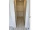 Walk-in closet with wire shelving and beige marble tile flooring at 17902 Cristin Way, Westfield, IN 46062