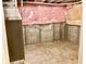 Unfinished basement area showcasing utility access and under-house systems at 1327 Blue Ridge Ln, Brownsburg, IN 46112