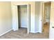 Bedroom featuring closet doors, carpeted floors and neutral wall color at 1327 Blue Ridge Ln, Brownsburg, IN 46112