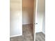 Neutral-toned closet with shelf and rod, carpeted flooring at 1327 Blue Ridge Ln, Brownsburg, IN 46112