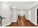 Large finished basement with hardwood floors, white trim and neutral colored walls at 8819 Anchor Bay Ct, Indianapolis, IN 46236
