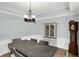 Traditional dining room featuring a wooden table and an elegant hutch at 8819 Anchor Bay Ct, Indianapolis, IN 46236
