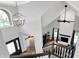 Bright foyer transitions into a living room with a fireplace and lots of natural light at 8819 Anchor Bay Ct, Indianapolis, IN 46236