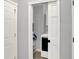 The laundry room is conveniently located with easy access and essential appliances at 8819 Anchor Bay Ct, Indianapolis, IN 46236