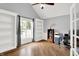 Office space featuring vaulted ceilings, built-in shelving and a large window at 8819 Anchor Bay Ct, Indianapolis, IN 46236