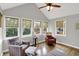 Inviting sunroom with vaulted ceilings and a lovely view at 8819 Anchor Bay Ct, Indianapolis, IN 46236
