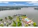 Overhead shot of condo community featuring a pool, marina, and expansive lake views at 102 Clarendon Dr # 409, Noblesville, IN 46062