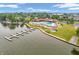 Wide aerial shot of a community with pool, docks, and lakefront views at 102 Clarendon Dr # 409, Noblesville, IN 46062