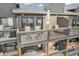 Multi-level balcony with outdoor seating perfect for enjoying the view and outdoor dining on the stone patio at 102 Clarendon Dr # 409, Noblesville, IN 46062