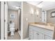 Well-maintained bathroom with a vanity, a mirror, and tiled shower with glass doors at 102 Clarendon Dr # 409, Noblesville, IN 46062