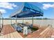Well-maintained boat dock featuring a covered lift, providing easy access to the lake for boating enthusiasts at 102 Clarendon Dr # 409, Noblesville, IN 46062