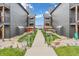 Exterior view of condo buildings with kayak storage and lakeside access at 102 Clarendon Dr # 409, Noblesville, IN 46062